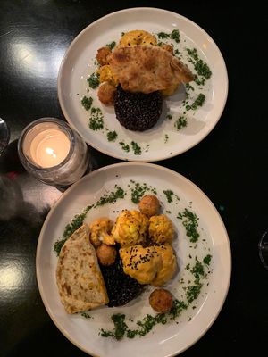 Cauliflower curry, black rice and naan  at Bonboon in Amsterdam