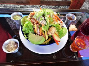 nice big salad bowl with tasty sauces at Namaste Vegan Food in Guatape