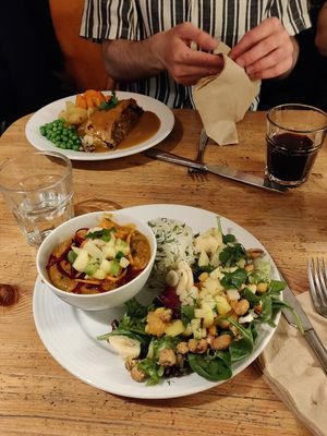 Malian sweet potato in cayenne pepper with rice and salad at Bonnington Cafe in South West London