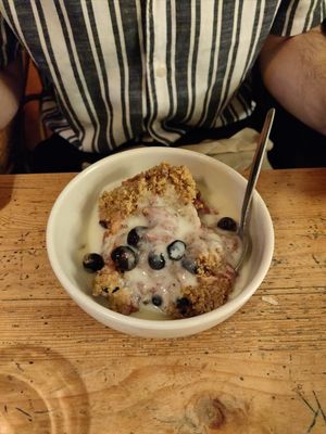 Vegan mixed fruit crumble with vegan custard at Bonnington Cafe in South West London