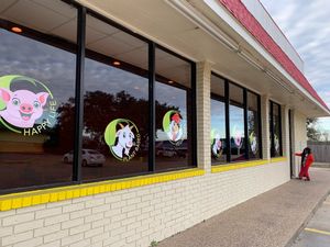 Love the cute animal pictures around the exterior! Welcoming smiles and sign! at Belenty's Love in Granbury