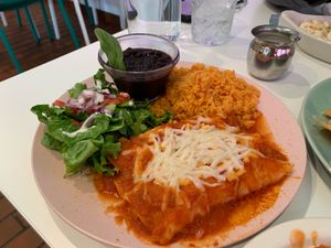 Warm, melty enchiladas! They let me have one of each chicken, beef, and cheese. at Belenty's Love in Granbury