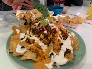 Huge nachos. Lots of toppings but no cheese. Would add cheese next time. at Belenty's Love in Granbury