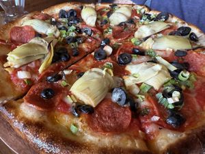 Vegan pepperoni and miyoko cheese substitution   at Creekside Pizza & Taproom in San Anselmo