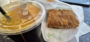 Fresh orange juice and Spanakopita at Gregores in Athens