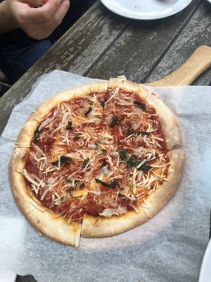 10-inch stone-baked pizzas: margherita (vegan option) $18  at Privé - Chijmes in Central Singapore