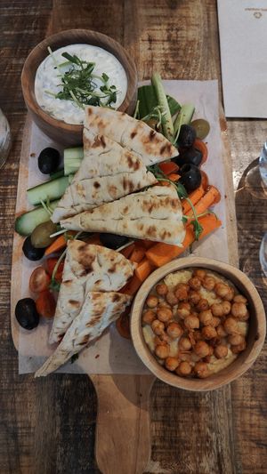 Appetizers like pita, hummus and tsatsiki sauce at The Urban Garden in Vilnius