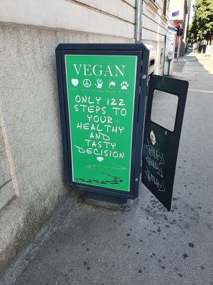 Ad in the street before arriving at the restaurant 💚 at Vegehop in Zagreb