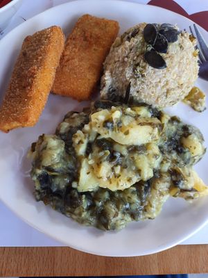 Traditional potato dish made with wakame seaweed instead of fish. at Vegehop in Zagreb