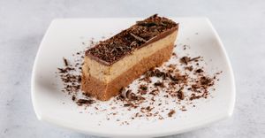 Chestnut bajadera

(chestnut, brown sugar, walnuts, hazelnuts, rum flavor, chocolate)
 at Vegehop in Zagreb