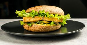 Tofu burger

(whole grain bagel, fried marinated tofu, pickles, tofunnaise, lettuce)
 at Vegehop in Zagreb