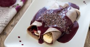Raw pancakes with chocolate cream and forest fruit sauce

(banana, forest fruits, agave syrup, cocoa oil, raw cocoa bean, cashew nuts)
 at Vegehop in Zagreb