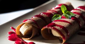 Raw pancakes with chocolate cream and forest fruit sauce  at Vegehop in Zagreb