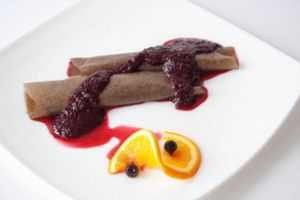 Raw pancakes with chocolate and forest fruits sauce at Vegehop in Zagreb