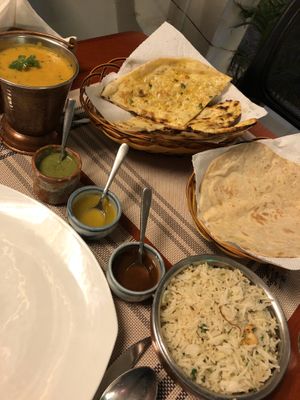 Dal fry, jeera rice, chapati, garlic naan at Simon's in Kampot
