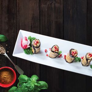 Eggplant Walnut Rolls - filled, rolled with walnuts paste, herbs and pomegranate. at Gruzie in Prague