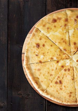 Khachapuri Imeruli - round bread filled with melted Imereti cheese. at Gruzie in Prague