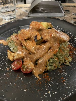 Noodles with tomato peanut sauce   at PELGAG in Kyoto