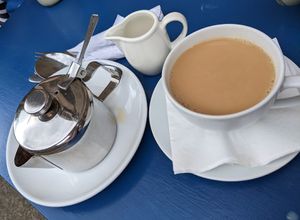 Tea with oatmilk at Deli Ecosse in Callander