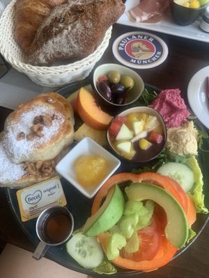 Pancakes breakfast with spreads, veggies and fruits. It also comes with a bread of choice (I took the walnut bread).  at Cafe Einstein in Ulm