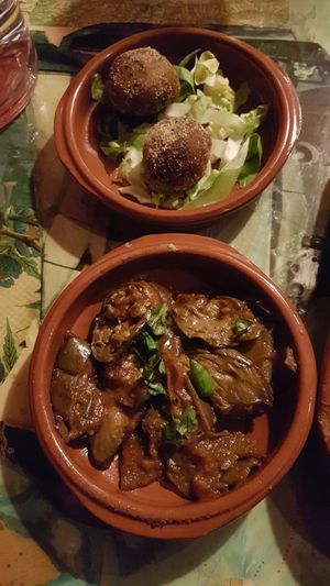 Balls made of white beans and a grilled eggplant dish for antipasti at Mamma Peppino in Alkmaar