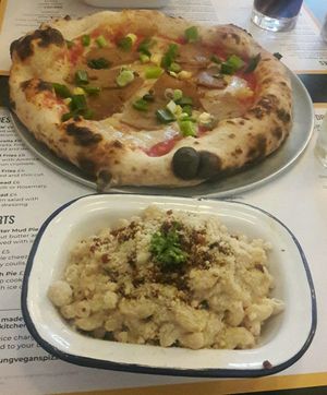 Pineapple pizza and mac n cheese at Young Vegans Pizza Shop in London