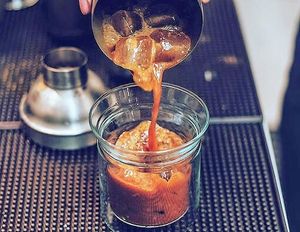 Viet Iced Coffee. Vietnamese-styled espresso, made with coconut condensed milk. Adding Cloud Foam for a bold and creamilicious coffee drink. Also available as a hot drink. at Rustle & Still in Toronto