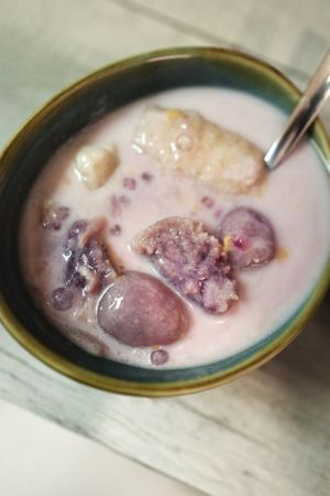 Bilo-Bilo (pronounced as bee-loh bee-loh)
A popular Filipino treat composed of purple sweet potato, banana, glutinous rice balls, coconut cream, sugar, sago pearls, and peanuts. at Rustle & Still in Toronto