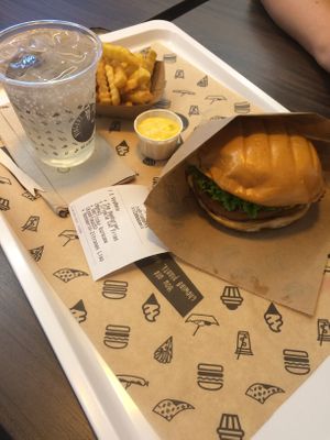 burger, fries and rosemary lemonade  at VINCENT - East Side Mall in Berlin
