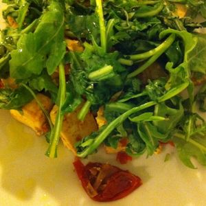 tofu with dried tomatoes and rocket at Oh Mio Bio in Turin