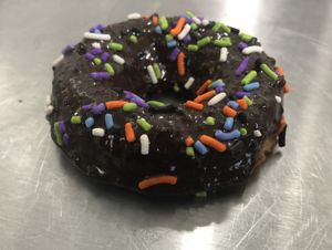 Chocolate Glazed Donut with Sprinkles - Vegan & Gluten-Free at Leo's Superfood Vegan Cafe in Northridge