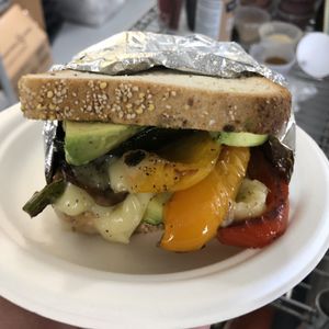 Pesto Roasted Vegetable Sandwich with Vegan Mozzarella & Avocado on Gluten-Free Toast at Leo's Superfood Vegan Cafe in Northridge