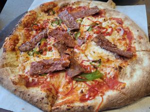 Tomato Base, Vegan Mozzarella, Vegan Bacon, Chillies and Maple Syrup at Hangin' Pizzeria in Betws-y-coed