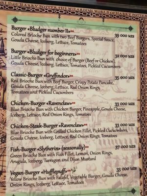 Veggie burgers labeled with 🌿. Cheese can be removed at Potter Mania in Tashkent