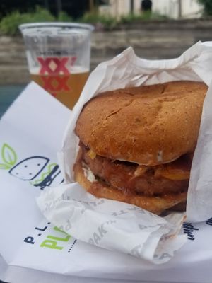 That way hands stay clean and it doesn't drip at Plow Burger - Hyde Park in Austin