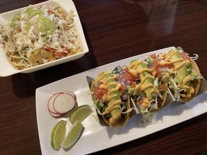 Asada Fries at top and Coconut Schrimp Tacos at bottom at Madre Tierra in Upland