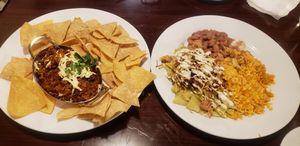 Choriqueso and Green Chilaquiles. Their Chilaquiles are very good. at Madre Tierra in Upland