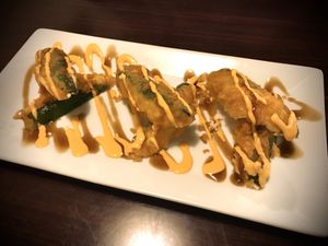 Hummingbirds: Stuffed jalapeños w/ vegan cream cheese and vegan crab mock meat at Madre Tierra in Upland