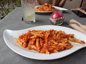 Vegan gluten-free home-made pasta with olive oil, tomato and oregano. Very simple but very good! at Blandis in Siena