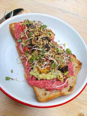 Smashed avocado toast with beet root hummus (10.5€) at Bohemian Kids Café in Leipzig
