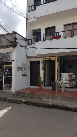 Their sign is on the wall, but it's the second doorway to the right. at Hojarasca Cultura Organica in El Carmen De Viboral