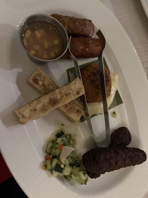 Various Vegan Proteins… LOVED the “fish cake"  at Walt Disney World - Sebastian's Bistro in Lake Buena Vista