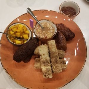 Impossible meat, GF breaded tofu, Beyond sausage, sauces with fresh fruit in them at Walt Disney World - Sebastian's Bistro in Lake Buena Vista