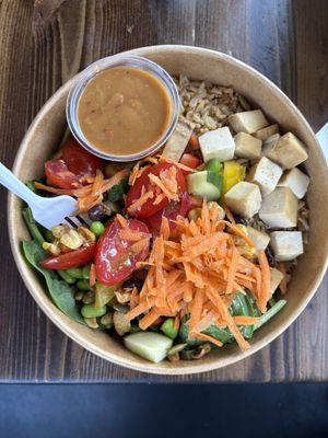 Create your own bowl with tofu and evil peanut dressing on the side  at The Chopped Leaf in Brandon