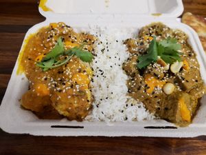Vegan (no) butter (no) chicken and panang curry, served with rice and homemade paratha. at TVX in Toronto