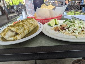 Plant-based burrito. The tacos were potato and grilled onions taco was delicious Love her salsa! at Adriana's in Cottonwood