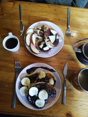 2 pancake plates: 1 with banana and chocolate and the other one with cherry jam and apples 😋 at French Made in Tienen
