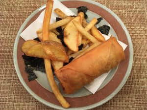 Fried potatoes with seaweed salt and a spring roll. at Marichou-K in Kanazawa