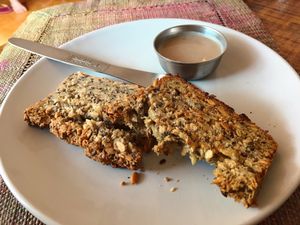 Freshly baked nut bread with homemade coconut butter, must try!  at Karma Cafe in Palolem