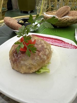 Vegetable Pastilla. Savory minced vegetables wrapped in a thin layer of phyllo dough and fried in oil. Impressive depth of flavor, a bit rich so the free bread and olives help  at Koulchi Zine in Marrakech